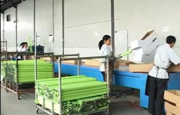 Factory packing line preparing metal components